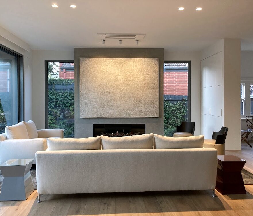 Provisional image: living room with artwork installed above the fireplace